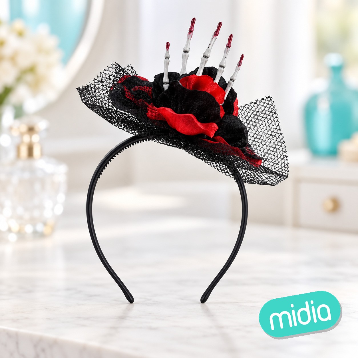 Diadema rosa con mano esqueleto
