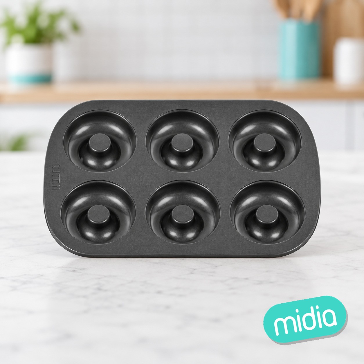 Molde horno rosquillas 6unds. 8.5cm quttin