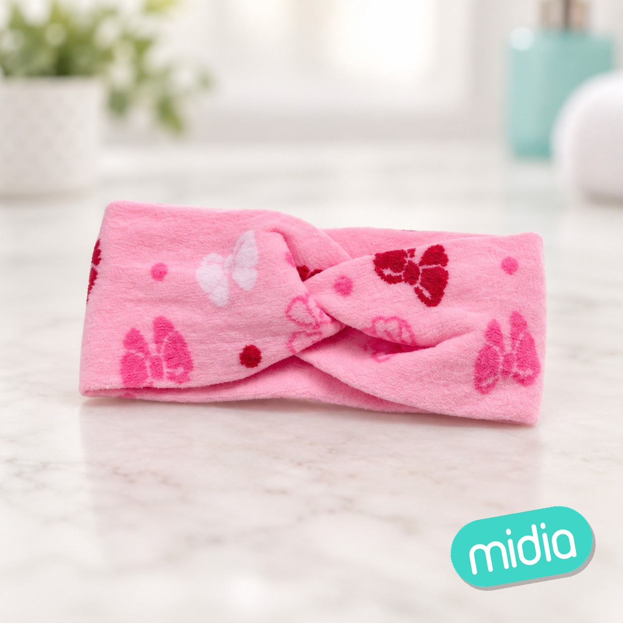 Diadema cruzada en color rosa 6cm*17cm