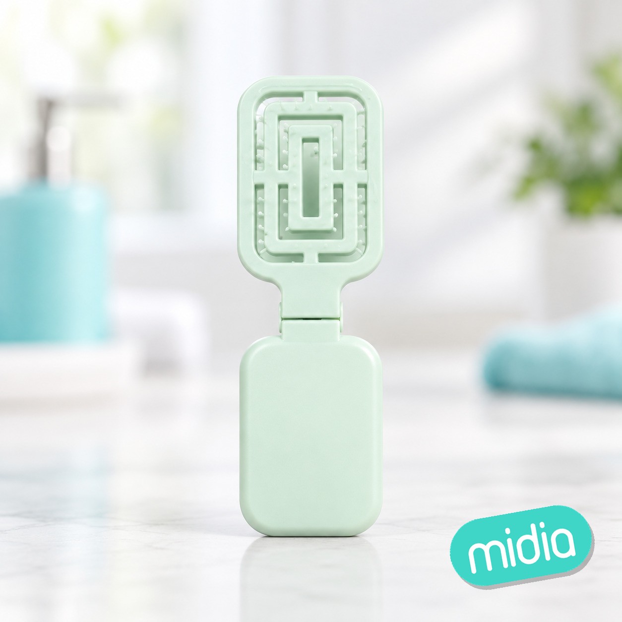 Cepillo plegable con espejo
