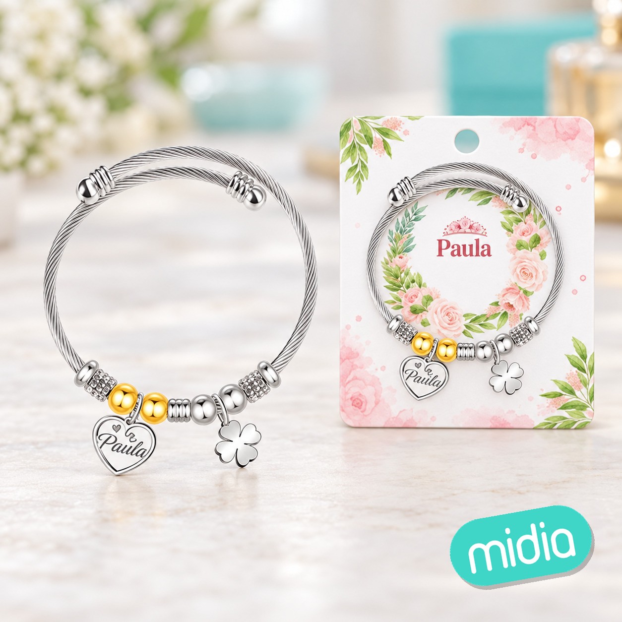 Brazalerte acero con nombre:paula